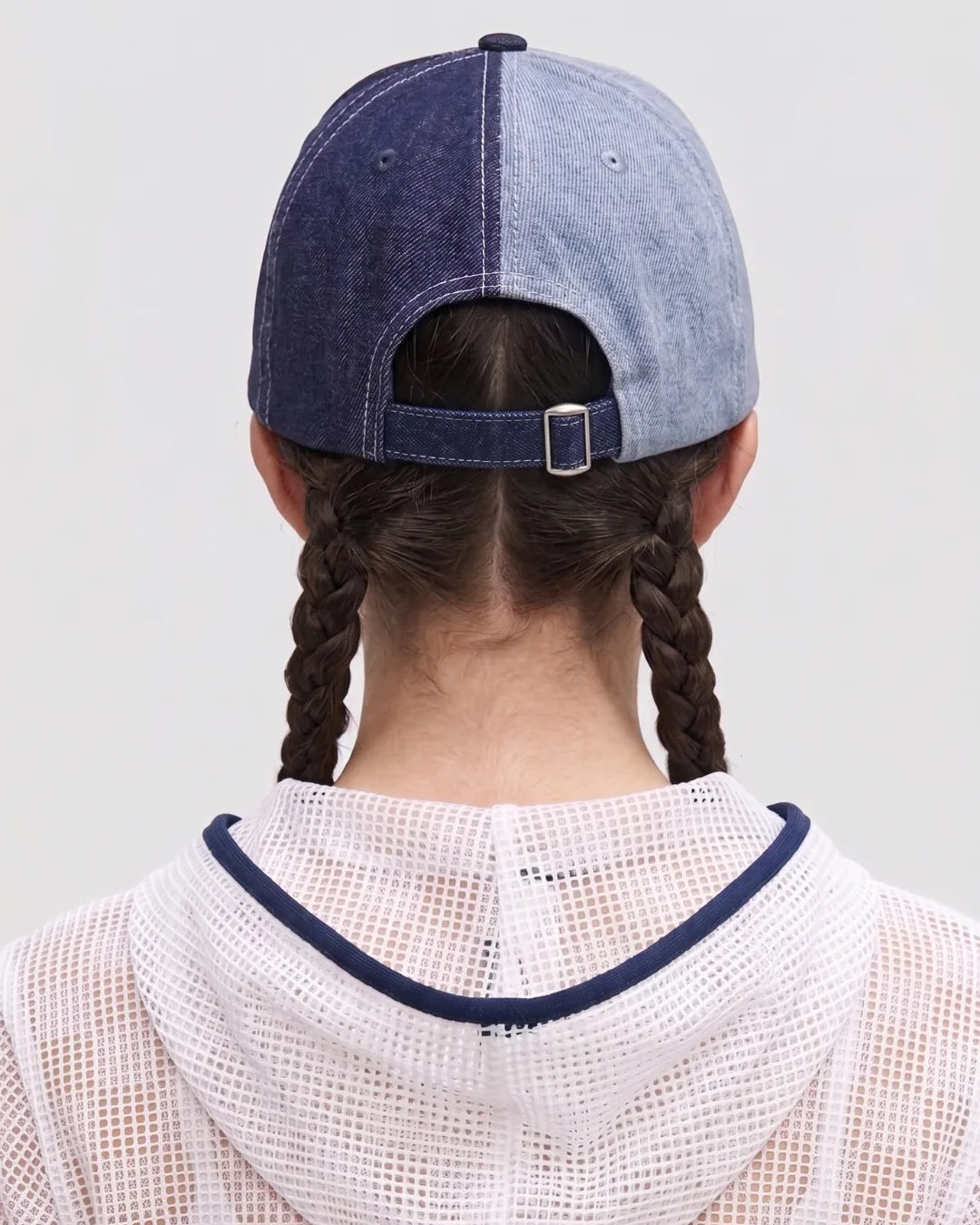 Split Two Tone Denim Graphic Cap – FOUROZ unisex denim cap – back view on model