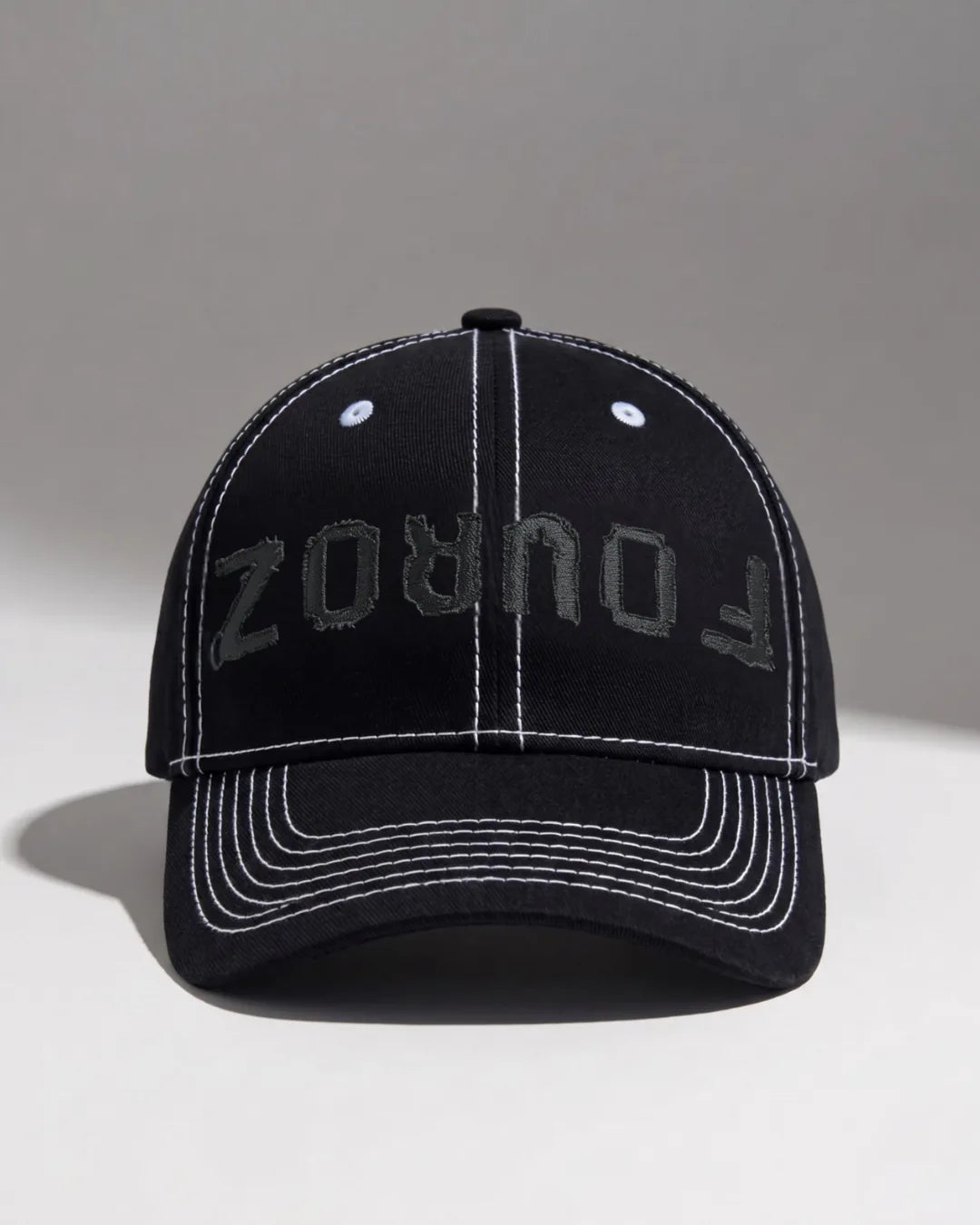 Black Street Typography Cap – FOUROZ unisex black cap – front view