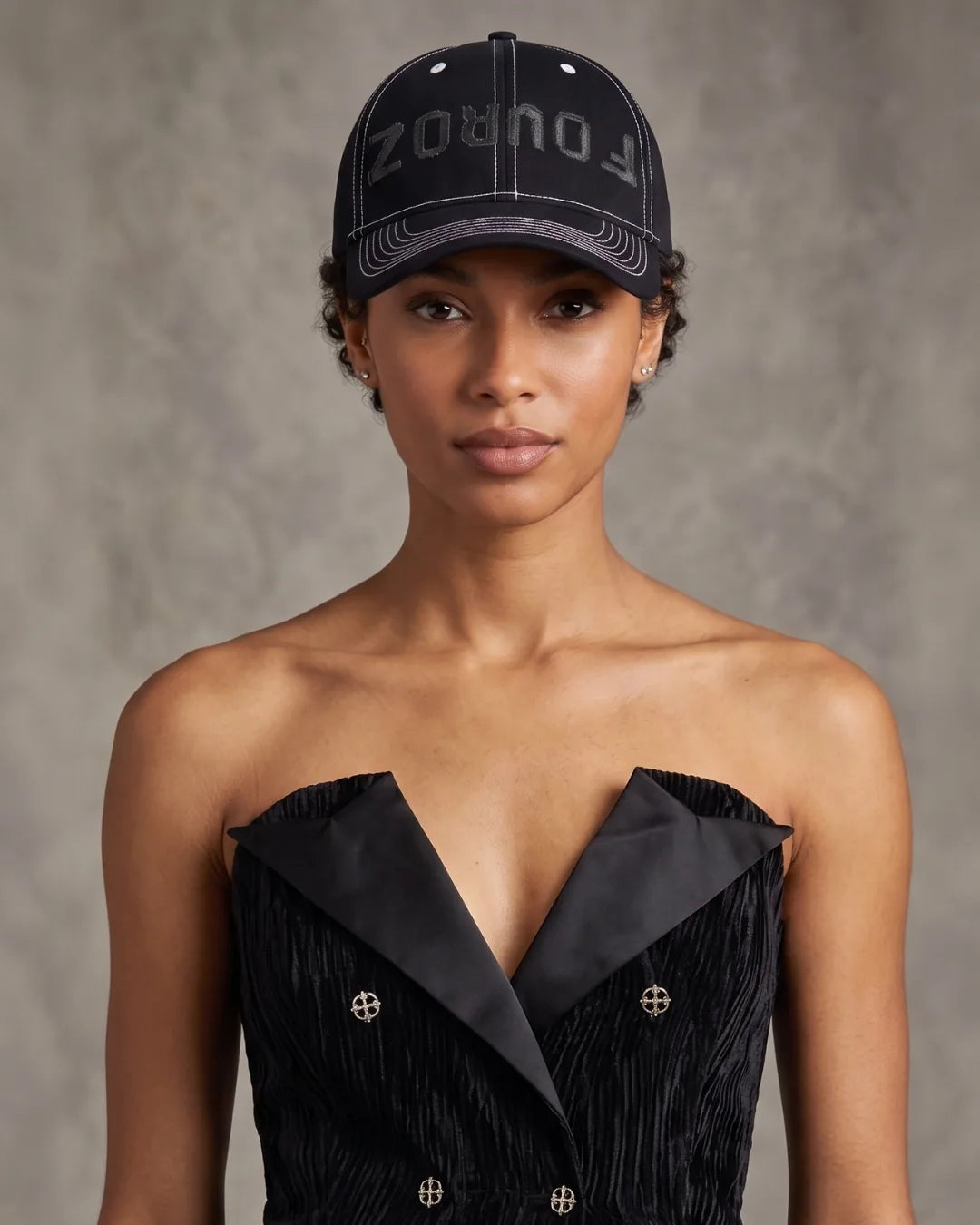 Black Street Typography Cap – FOUROZ unisex black cap – on model