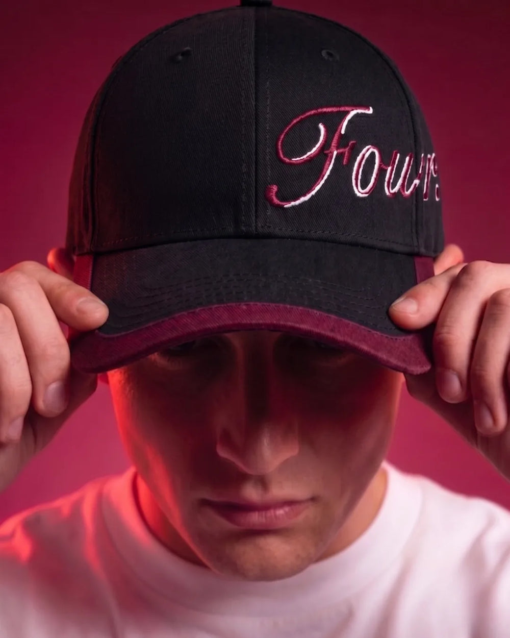 Red Flame Typography Black Cap – FOUROZ script cap on model – front view
